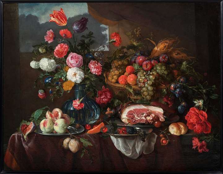 Still life of a vase of flowers, a basket of fruit and some flowers, a ham and a sausage on a pewter dish, fruit on pewter plates, and a bread roll.